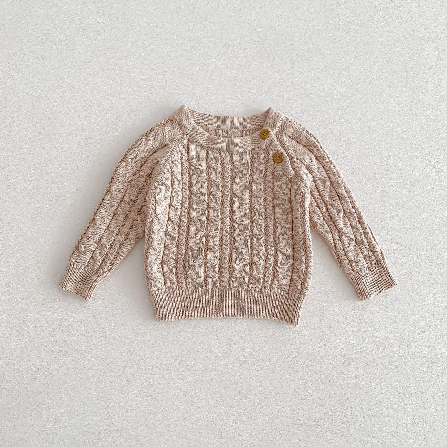 Tutina Salopette in maglia intrecciata con bretelle