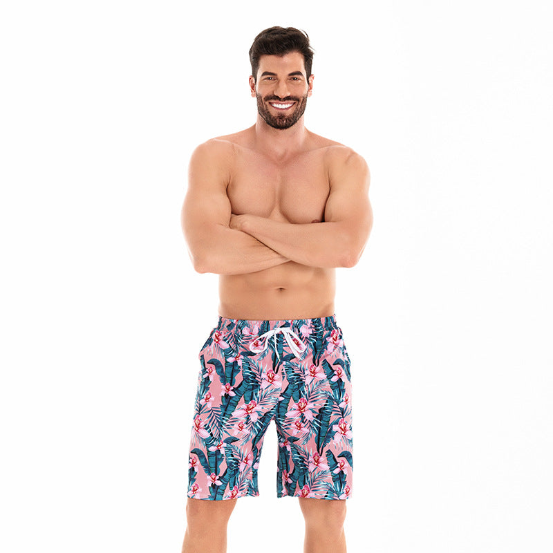 Costumi coordinati famiglia – Stampa tropicale rosa e verde