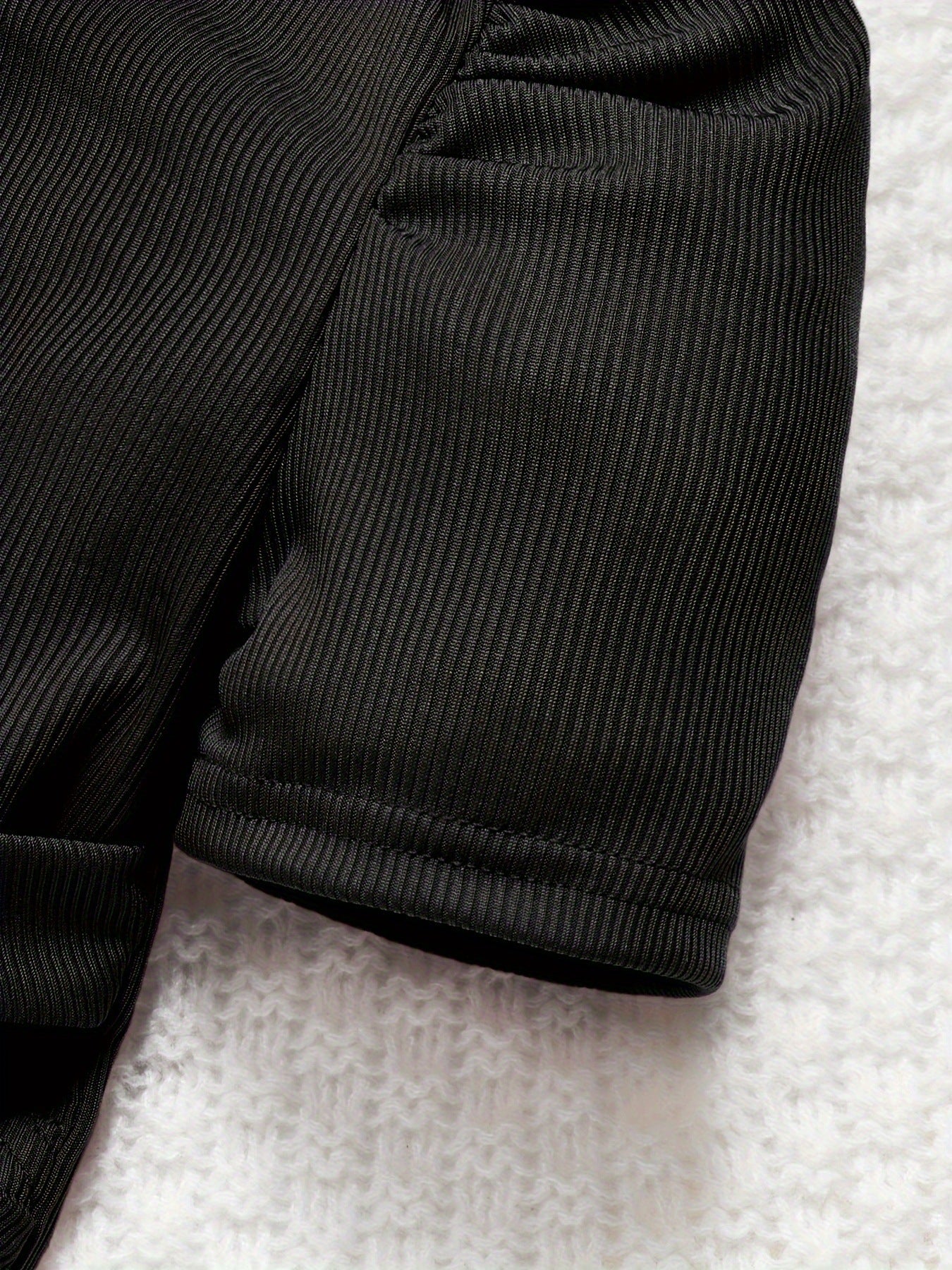 Set Elegante per Bambina – Top Nero con Maniche a Sbuffo e Pantaloni a Zampa