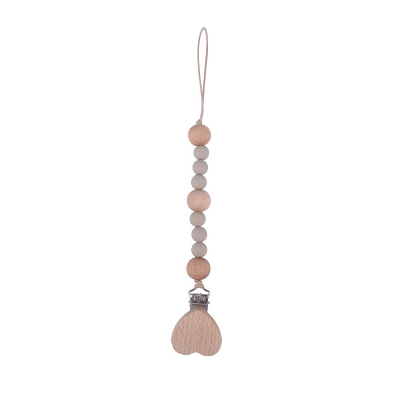 Portaciuccio in Legno e Silicone Cuore– Design Naturale con Perline