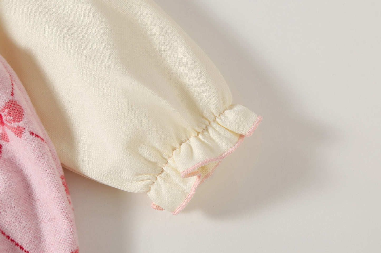 Pagliaccetto bimba con fiocco rosa e cappellino