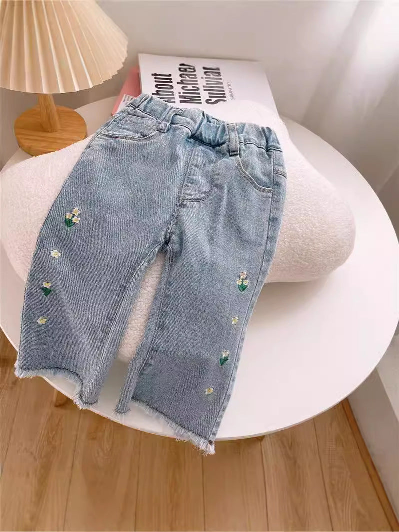 Jeans Bambina con Ricami Floreali e Fondo Sfilacciato