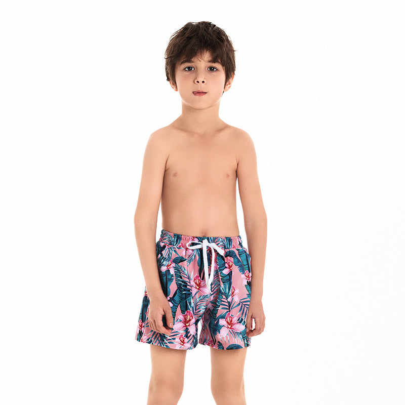 Costumi coordinati famiglia – Stampa tropicale rosa e verde