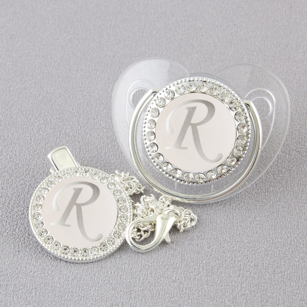 Set Ciuccio Trasparente e argento Luxury con Clip – Personalizzato con Iniziale 6-12 mesi