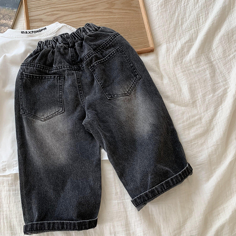 Jeans Bambino Nero Vintage con Strappo e Dettagli Asimmetrici