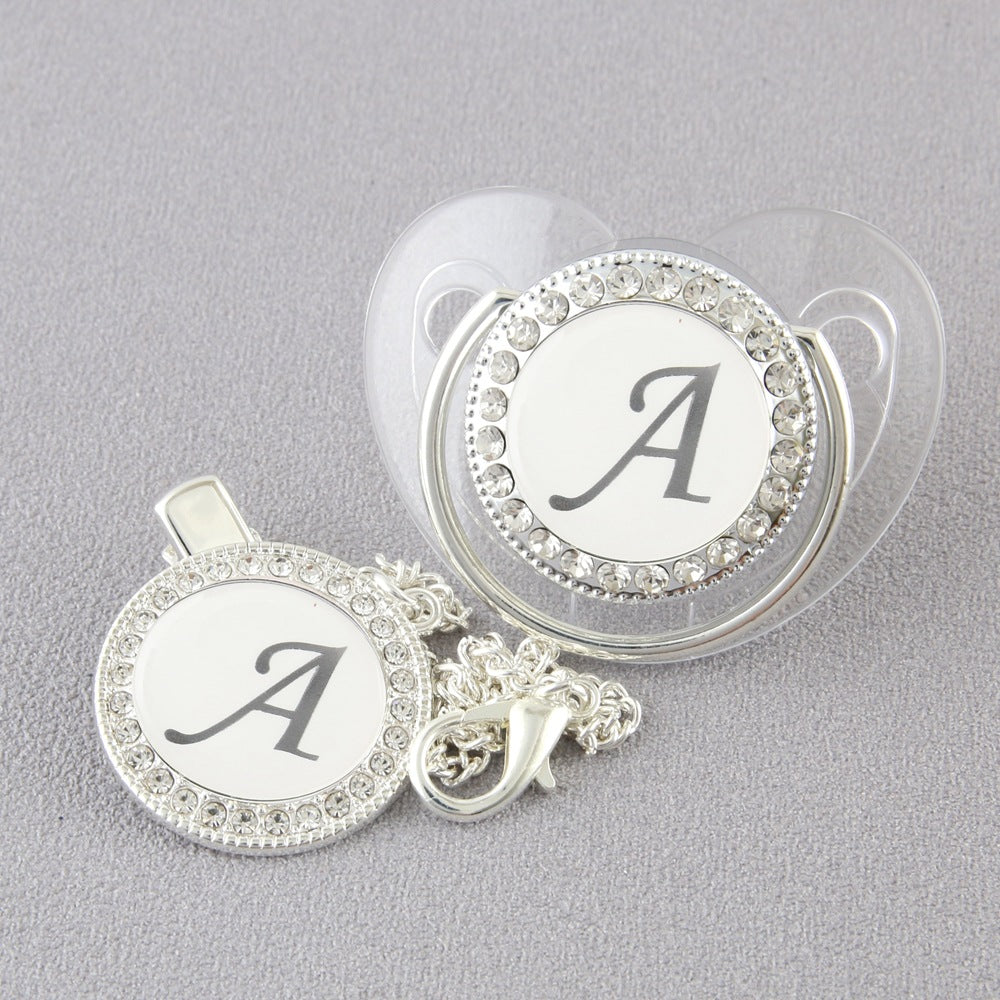 Set Ciuccio Trasparente e argento Luxury con Clip – Personalizzato con Iniziale 6-12 mesi