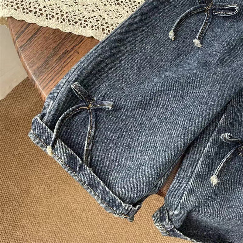 Jeans bimba in denim con fiocchi