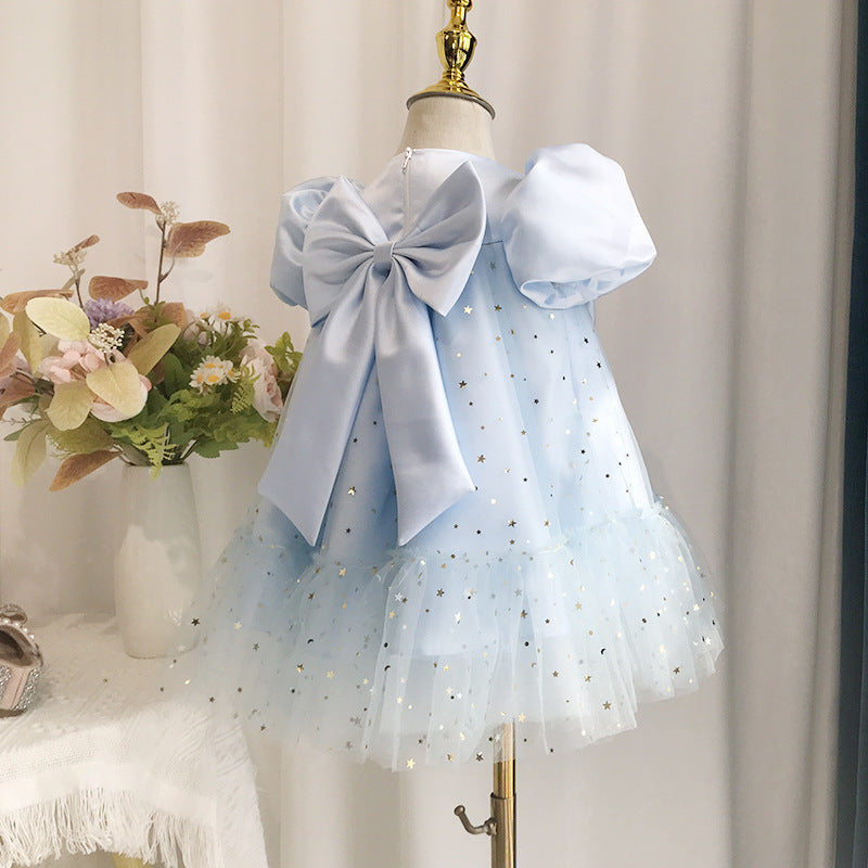 Abito Celeste Bimba con Tulle Stellato e Fiocco Elegante