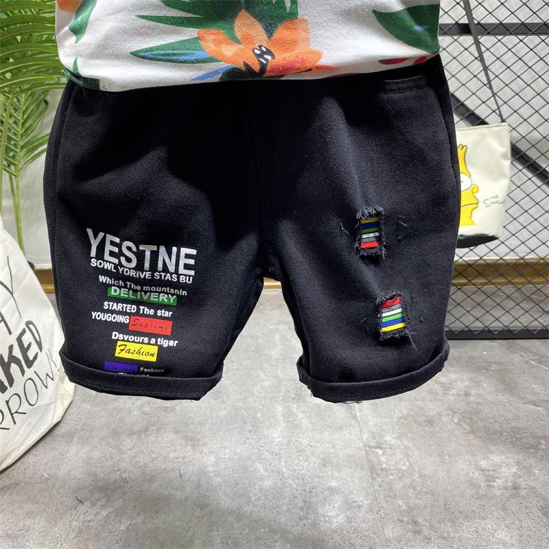 Completo Estivo Bambino Polo Tropicale e Shorts Bianchi