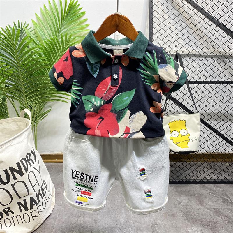 Completo Estivo Bambino Polo Tropicale e Shorts Bianchi