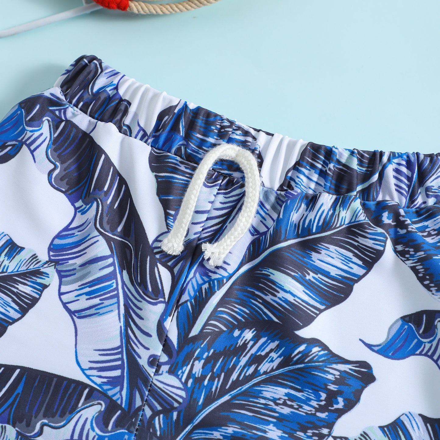 Costume Mare Bambino con Fantasia Tropicale Foglie Blu