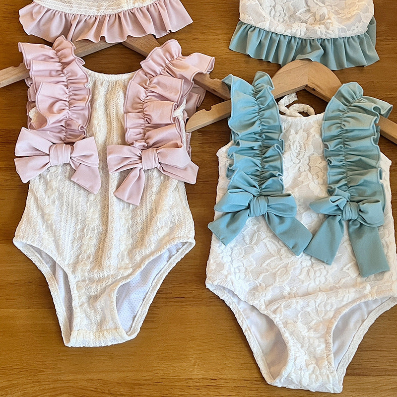 Costume da bagno in pizzo con fiocco