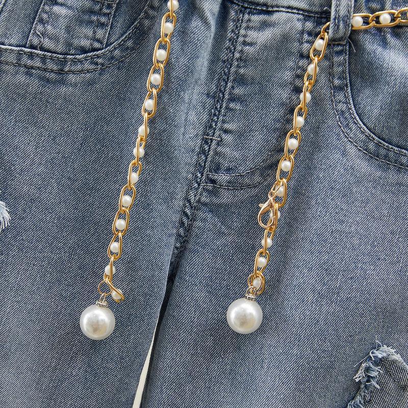 Jeans Strappati con Stelle e Dettagli Gioiello