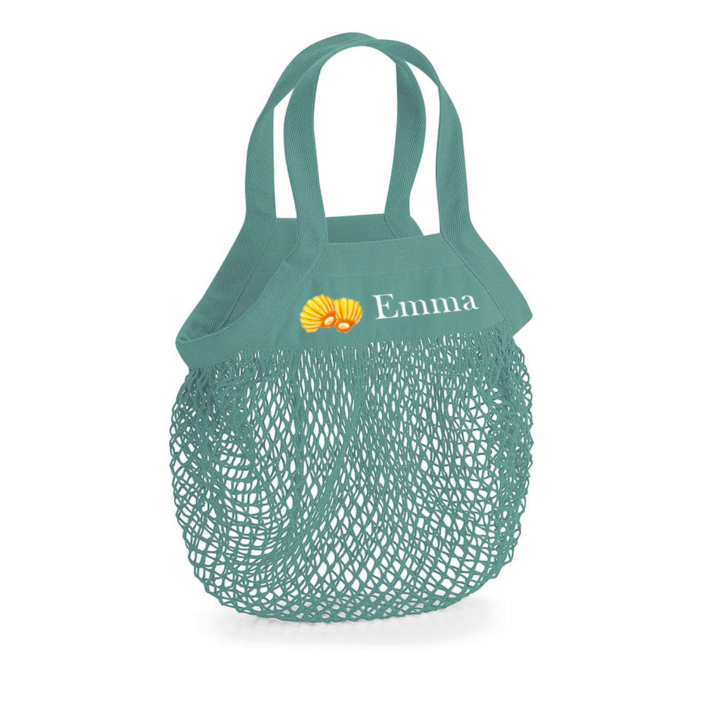 Cesta personalizada de juegos junto al mar