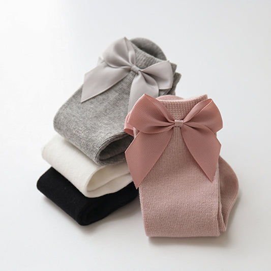 Calzini al ginocchio bambina con fiocco in raso posteriore – Vari colori