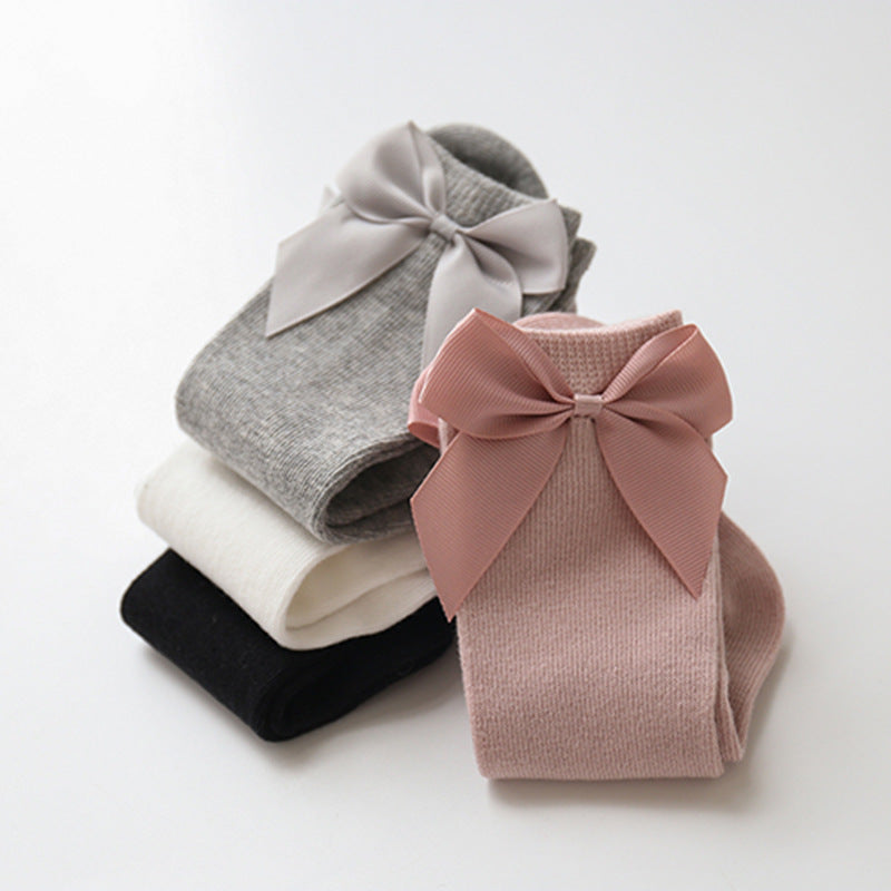 Calzini al ginocchio bambina con fiocco in raso posteriore – Vari colori