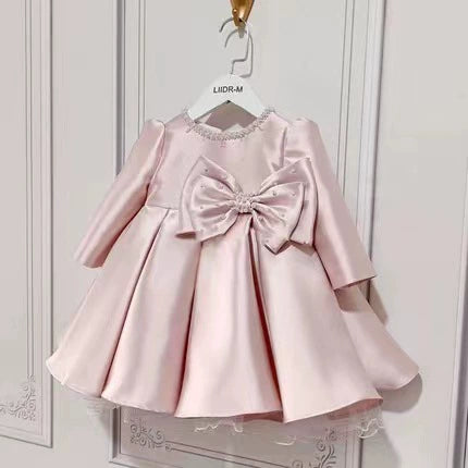 Abito Elegante Bambina Rosa con Fiocco – SCOLLATO E MANIUCA LUNGA