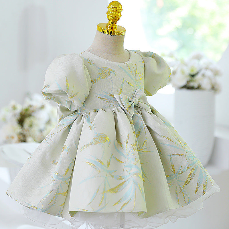 Abito cerimonia bambina elegante con maniche a sbuffo e fiocco