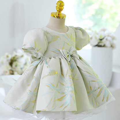 Abito cerimonia bambina elegante con maniche a sbuffo e fiocco