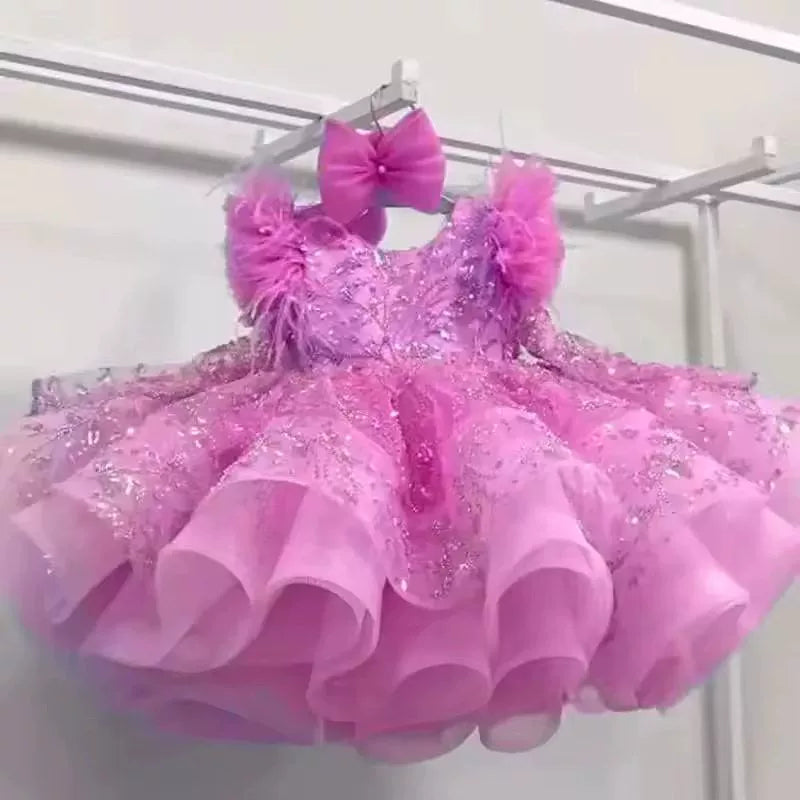 Vestito cerimonia elegante bambina con piume e ricami glitter