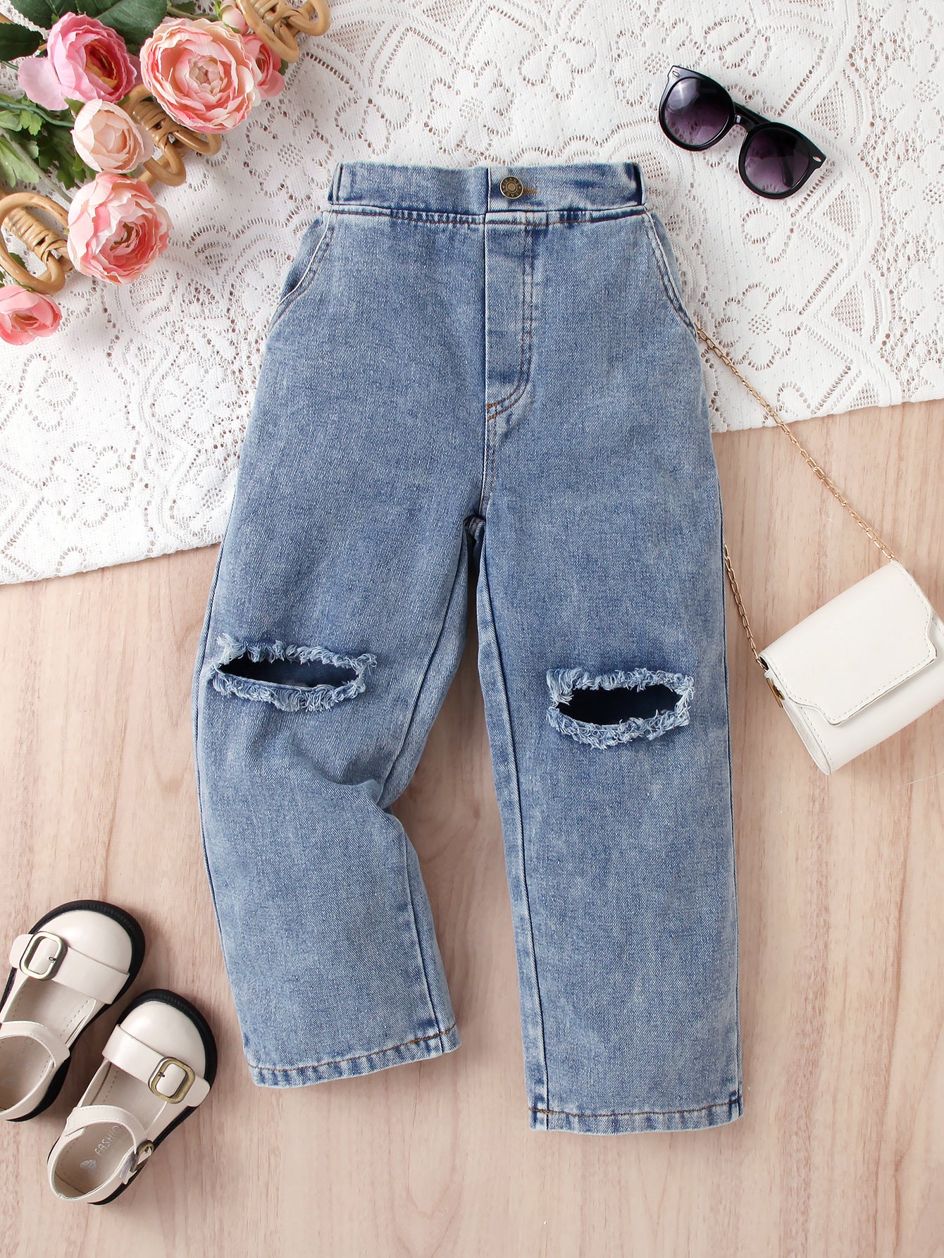 Jeans bambina con strappi sulle ginocchia – stile urban trendy