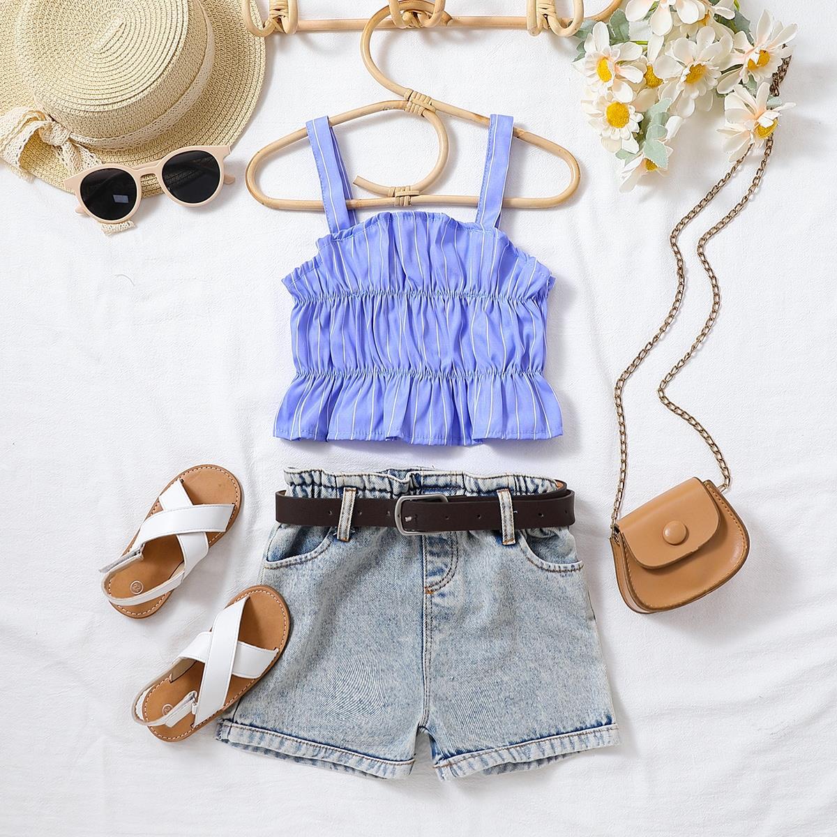 Completo estivo bambina con top lilla e shorts in denim