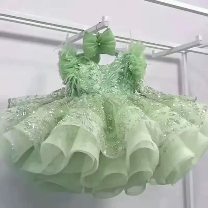 Vestito cerimonia elegante bambina con piume e ricami glitter