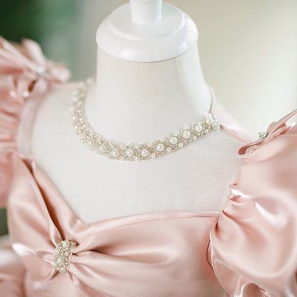 Abito da cerimonia bambina in raso rosa cipria con maniche a palloncino