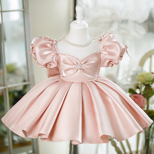 Abito da cerimonia bambina in raso rosa cipria con maniche a palloncino