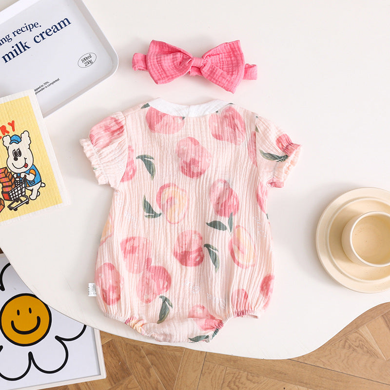 Pagliaccetto Neonato in Mussola con Stampa Pesche e Fiocchi