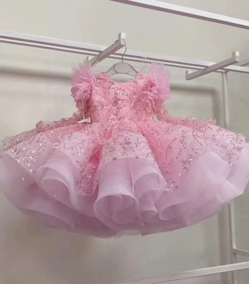 Vestito cerimonia elegante bambina con piume e ricami glitter