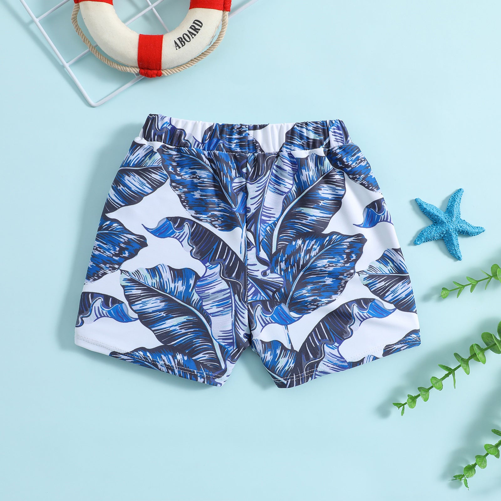 Costume Mare Bambino con Fantasia Tropicale Foglie Blu