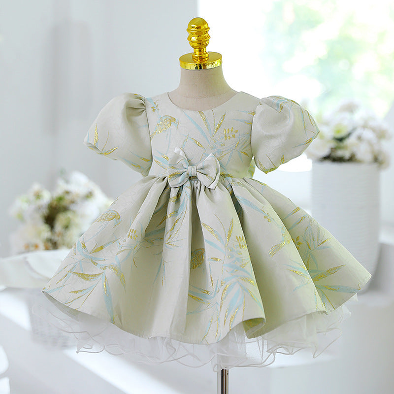 Abito cerimonia bambina elegante con maniche a sbuffo e fiocco