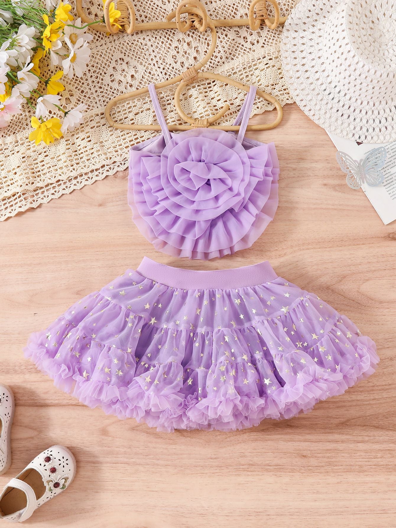 Completo estivo bambina lilla con top a fiori e gonnellina in tulle stellato