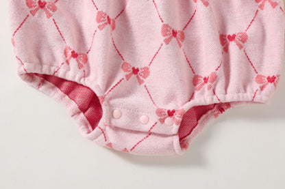 Pagliaccetto bimba con  fiocco rosa e cappellino