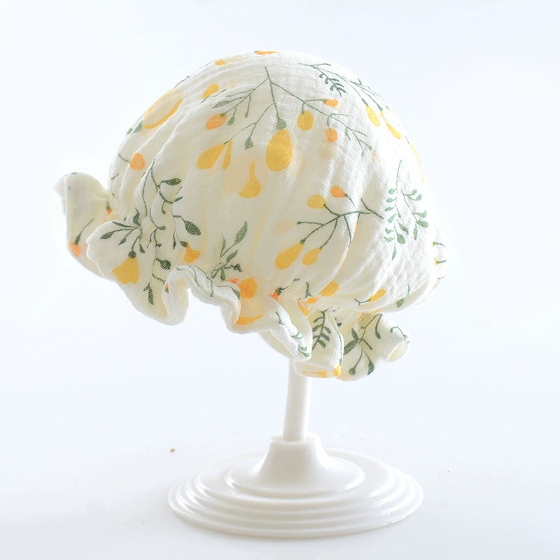 Cappellino Neonato in Mussola di Cotone – Fantasia Rami Gialli