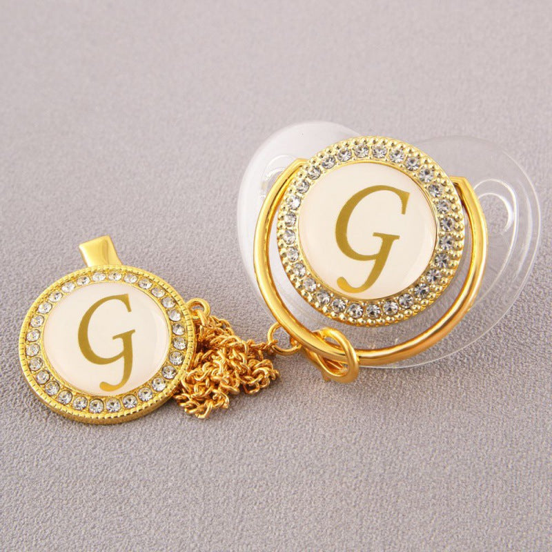 Set Ciuccio Trasparente e oro  Luxury con Clip – Personalizzato con Iniziale 6-12 mesi