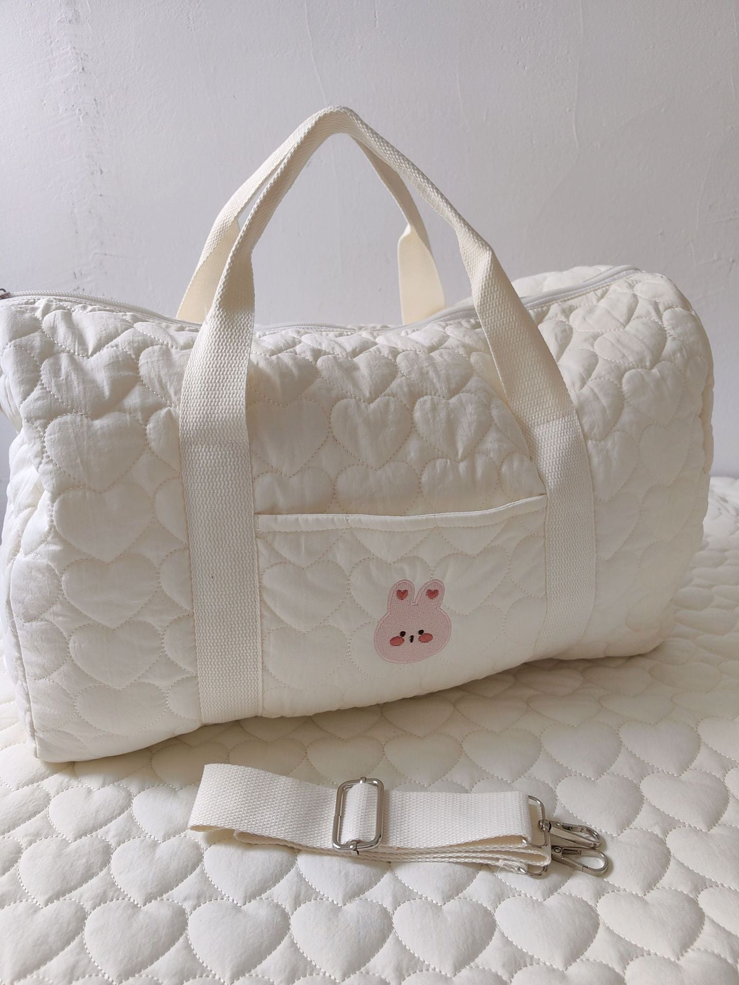 Borsone trapuntata bianca con patch animaletti