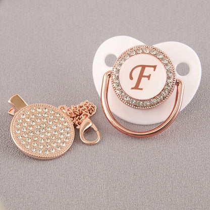 Set Ciuccio Luxury Bianco e oro rosa con Clip – Personalizzato con Iniziale (6-12 mesi)