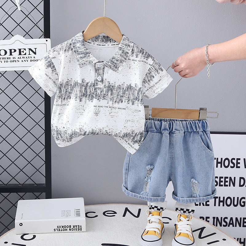 Completo Bimbo Polo Stampata e Pantaloncini Denim Strappati