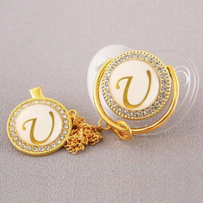 Set Ciuccio Trasparente e oro  Luxury con Clip – Personalizzato con Iniziale 6-12 mesi