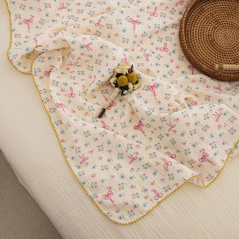 Copertina Neonato 100x130 cm in Puro Cotone – Fantasia Fiocchi Rosa e Fiori Pastello