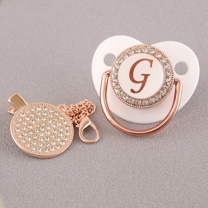 Set Ciuccio Luxury Bianco e oro rosa con Clip – Personalizzato con Iniziale (6-12 mesi)