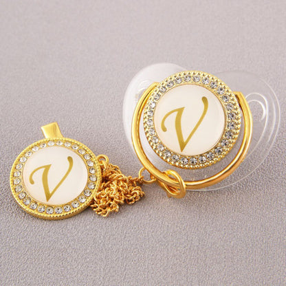 Set Ciuccio Trasparente e oro  Luxury con Clip – Personalizzato con Iniziale 6-12 mesi