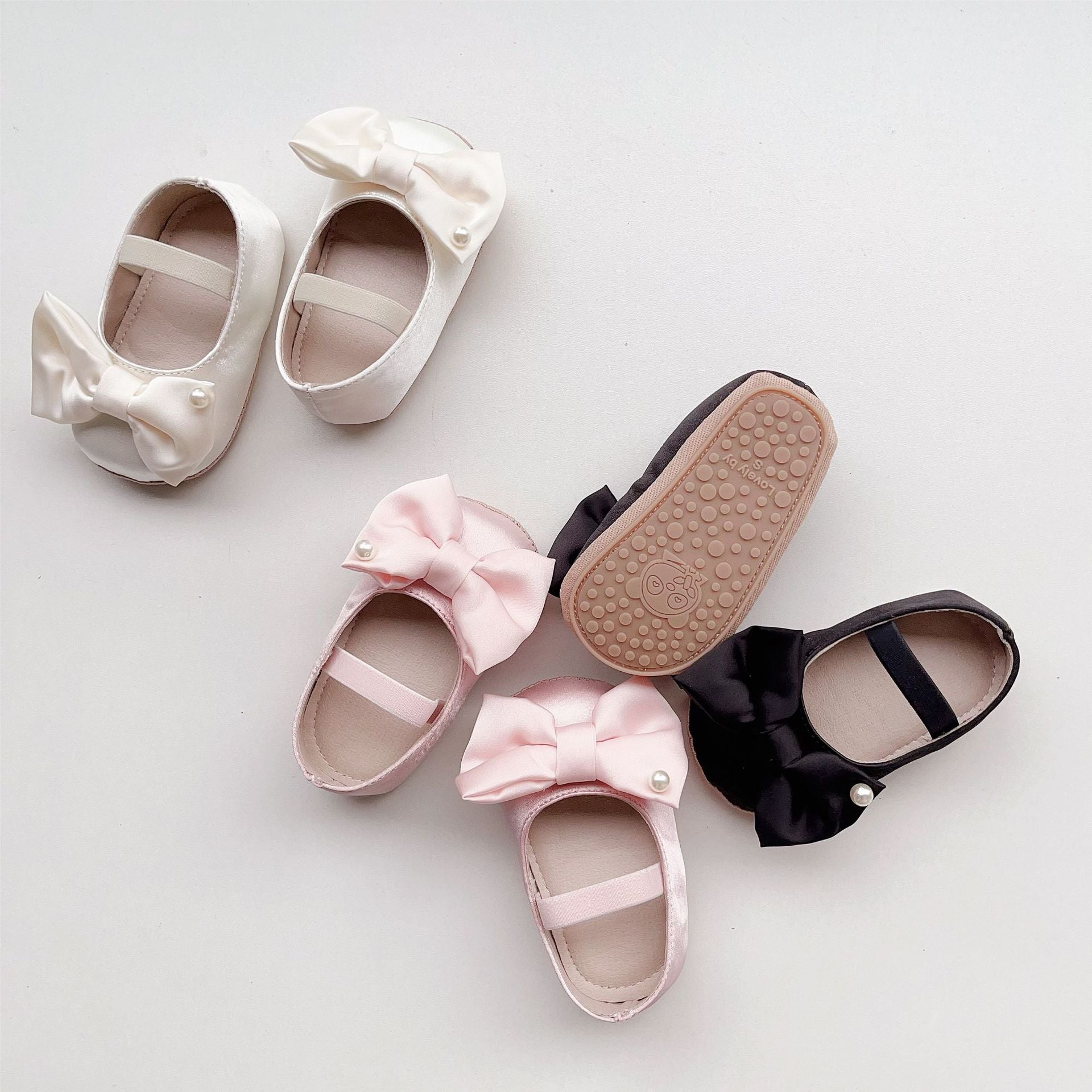 Scarpe con suola con fiocco