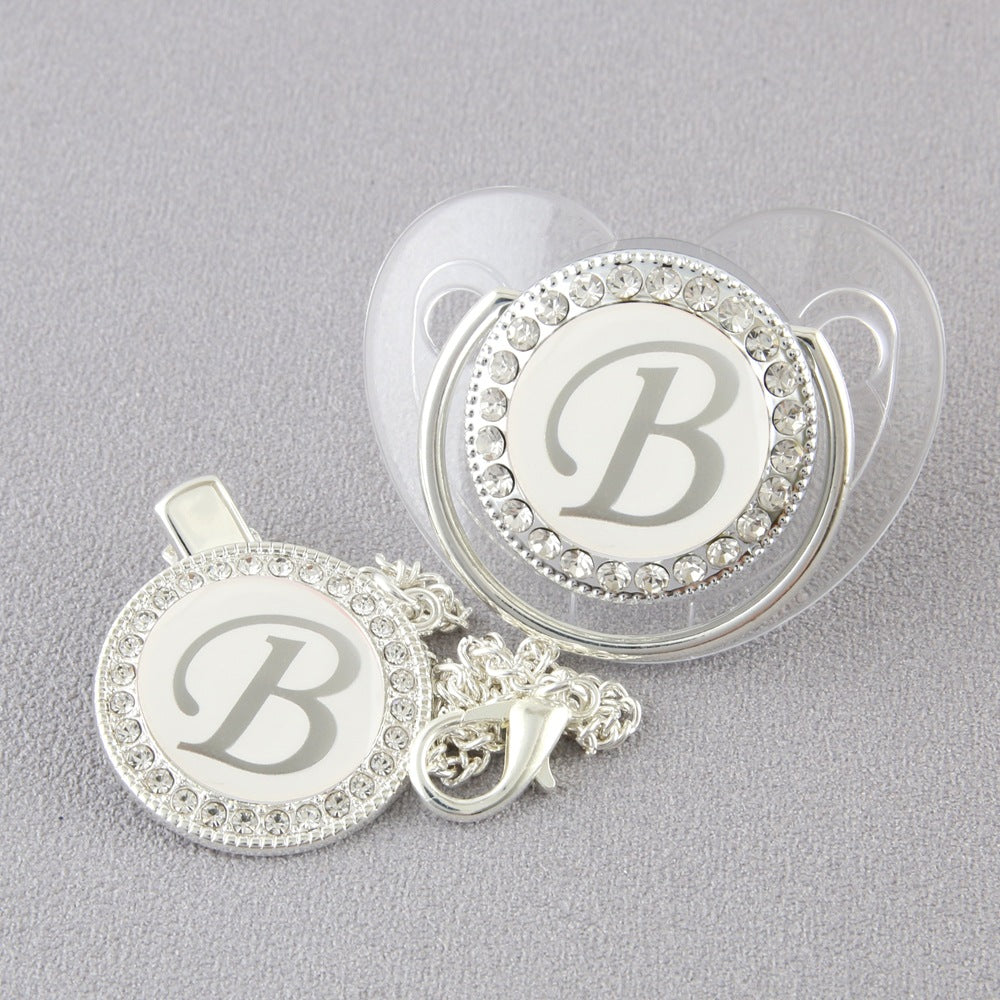 Set Ciuccio Trasparente e argento  Luxury con Clip – Personalizzato con Iniziale 6-12 mesi