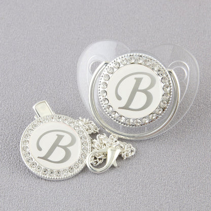 Set Ciuccio Trasparente e argento  Luxury con Clip – Personalizzato con Iniziale 6-12 mesi