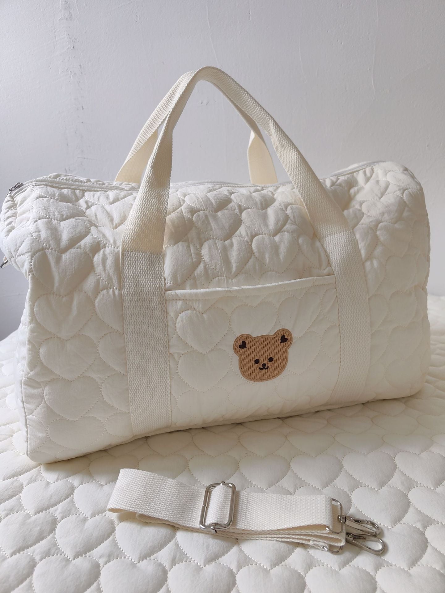 Borsone trapuntata bianca con patch animaletti