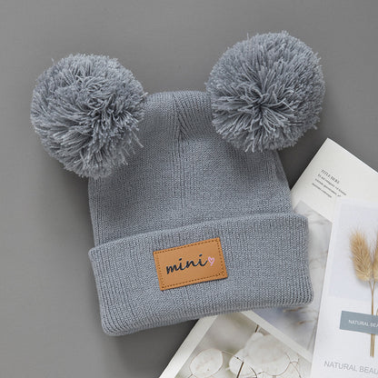 Cappellino in maglia “Mini” con doppio pompon – Invernale, caldo e morbido