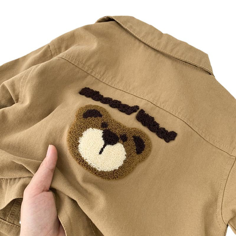 Giacca beige bambino con ricamo orsetto – stile casual